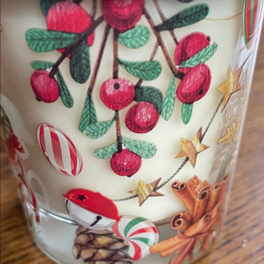 Festive Holiday Candy Cane Candle with Silver Lid .Lovely peppermint scent.